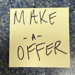 Yellow Sticky Note with Black Text